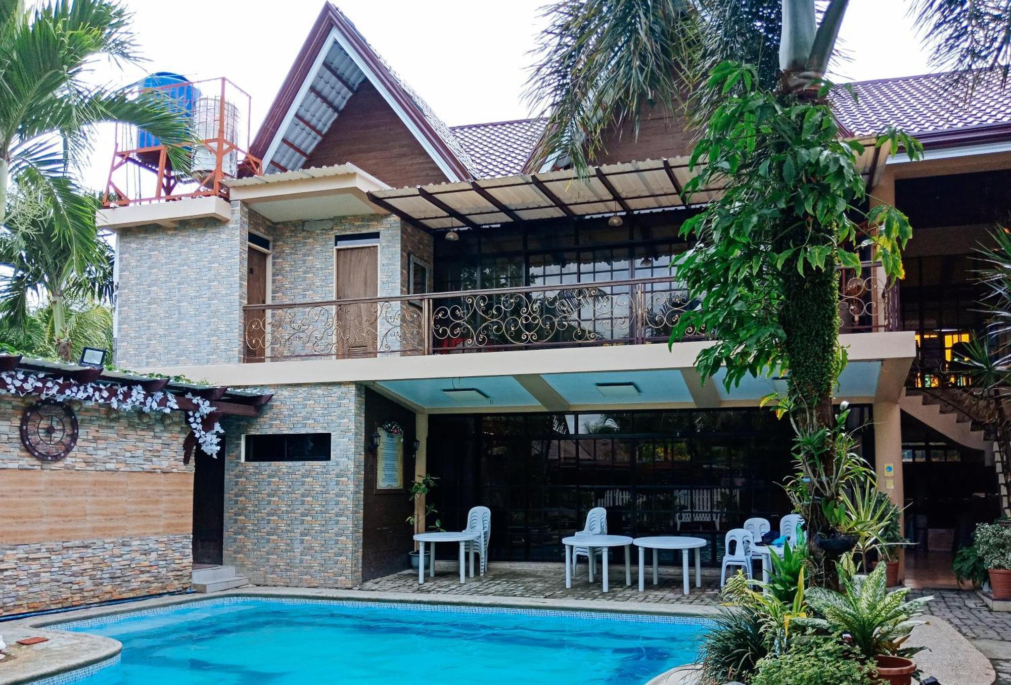 Villa Asuncion Country Inn And Resort Iloilo By Reddoorz Tigbauan Bagian luar foto